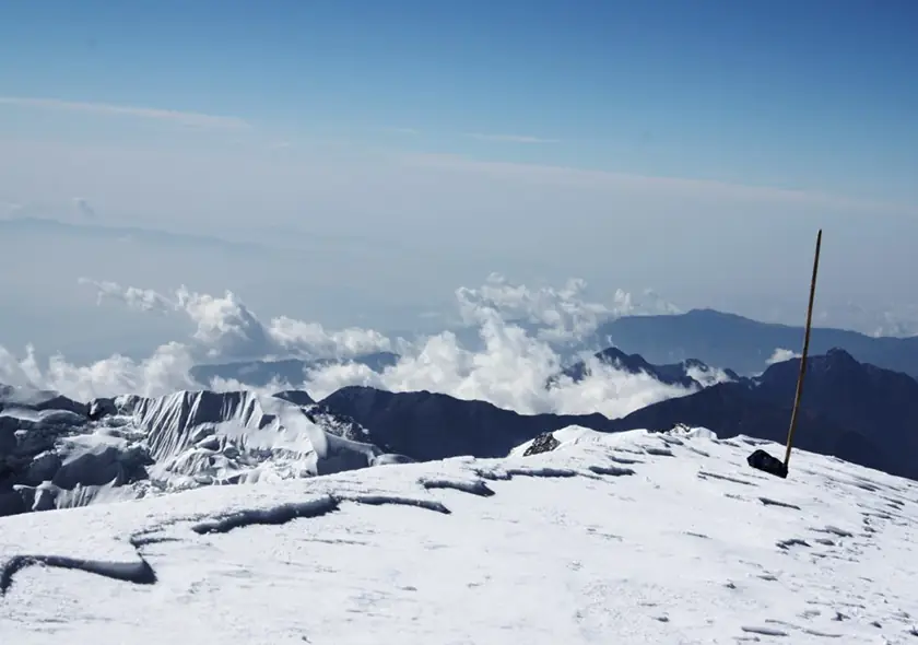 Climbers celebrating on the Mera Peak summit